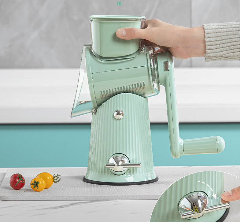 Multi-functional vegetable cutter with hand-operated rocker-style cutting mechanism