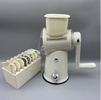 Multi-functional vegetable cutter with hand-operated rocker-style cutting mechanism